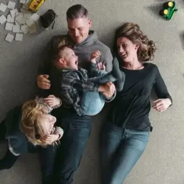 After-Carpet-Install Happy family | Titan Flooring